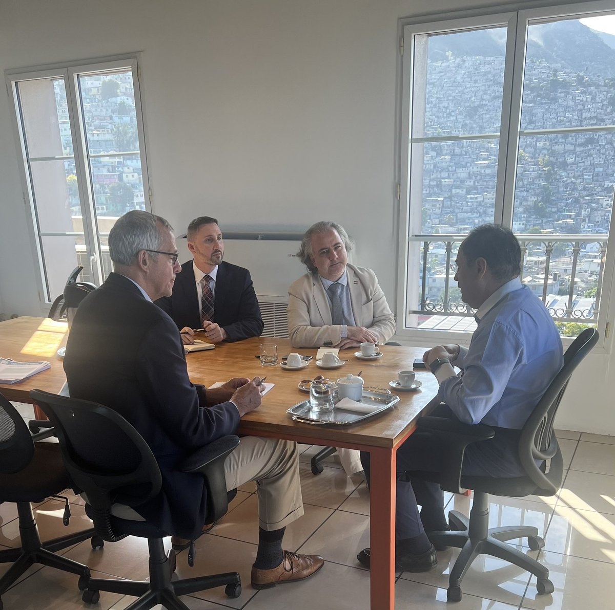 OEAHaiti's tweet photo. SRSG @CristoDupouy and his team were honored to welcome Keith Mines from @USIP to #Haiti today. @Mineskw will be meeting with political actors, civil society, the private sector and the international community over the next three days regarding solutions to the current crisis. https://t.co/tEBwUiUJgc