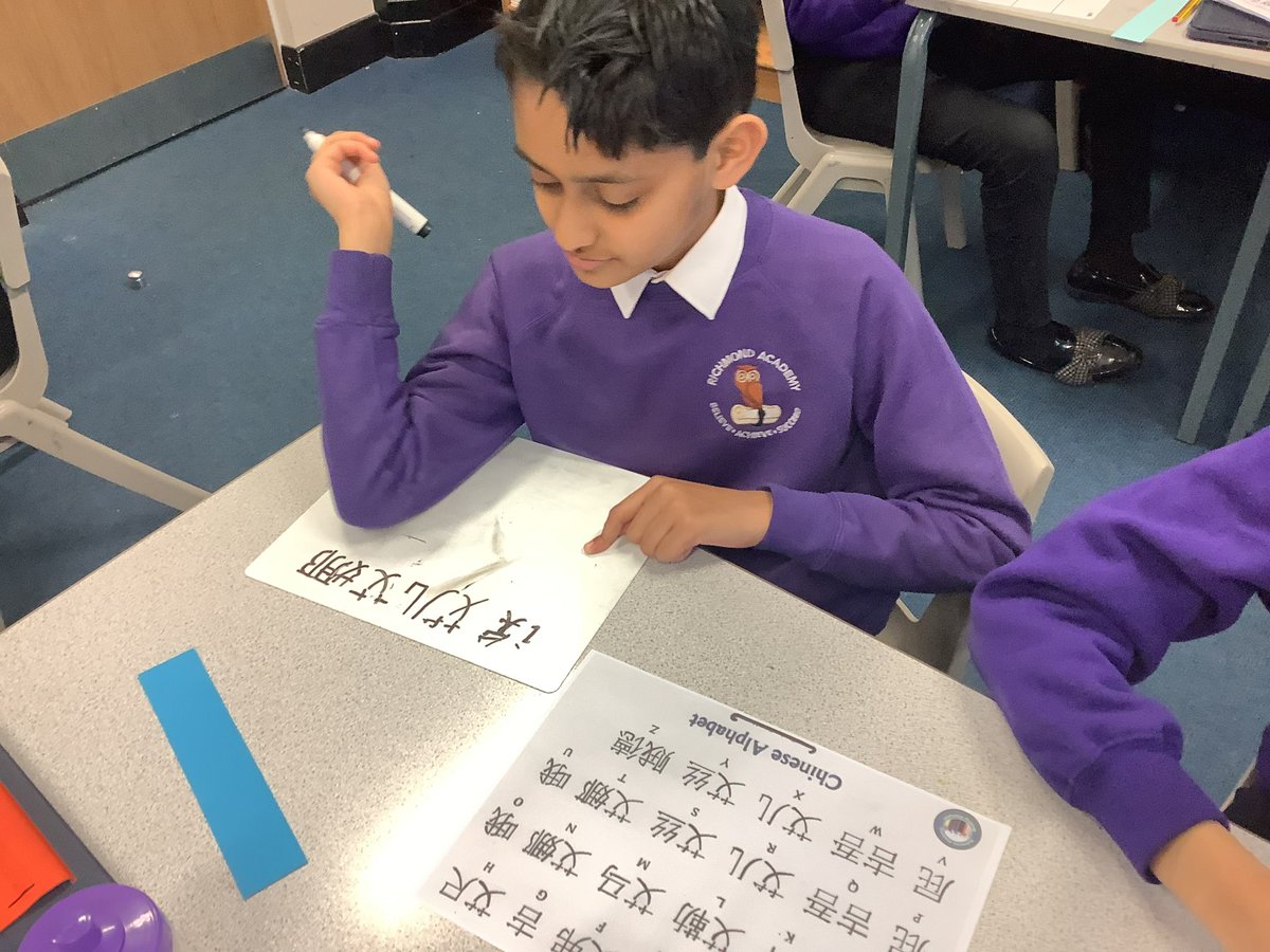 We have had a fun afternoon celebrating Chinese New Year in Onyx class today. We tried our hands at writing in Chinese and designing our own dragon masks.