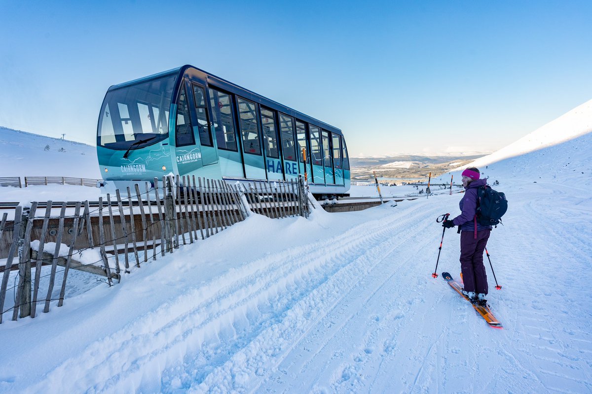 Aviemoron's tweet photo. My pic of @joyfuljune looking at the now fixed and running Cairngorm furnicular is hitting up the media just now! I’ll be able to retire on this pic #iwish https://t.co/7tbXAfbAB9