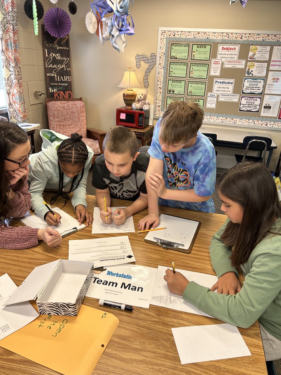Powerful learning with collaboration and teamwork as students worked to master the codes for the #breakout #longdivision