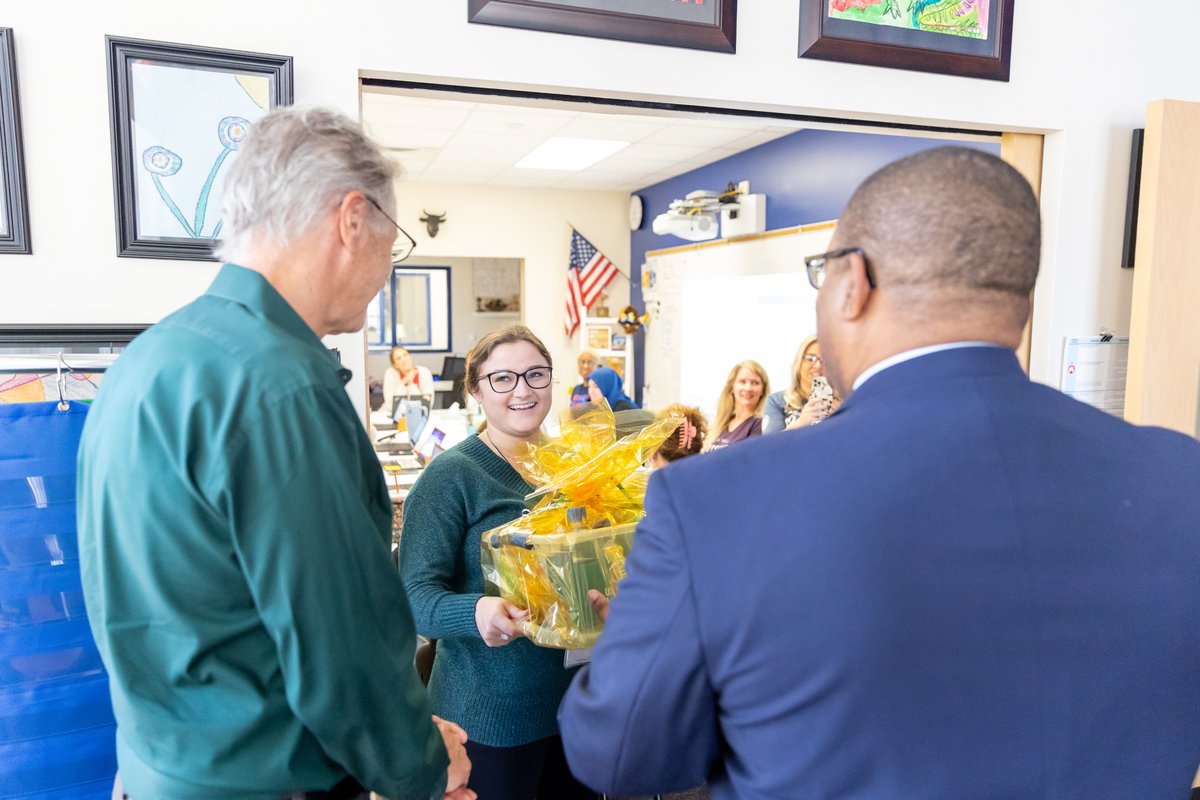 educationUSF's tweet photo. Alyssa Santana, a new teacher at Wiregrass Ranch Elementary School was surprised today with a “Congratulations” basket from the USF Education Alumni Society. And she was even wearing her USF green for her meeting with Dean Rolle! @pascoschools #edusociety https://t.co/ehwW1XXAdV