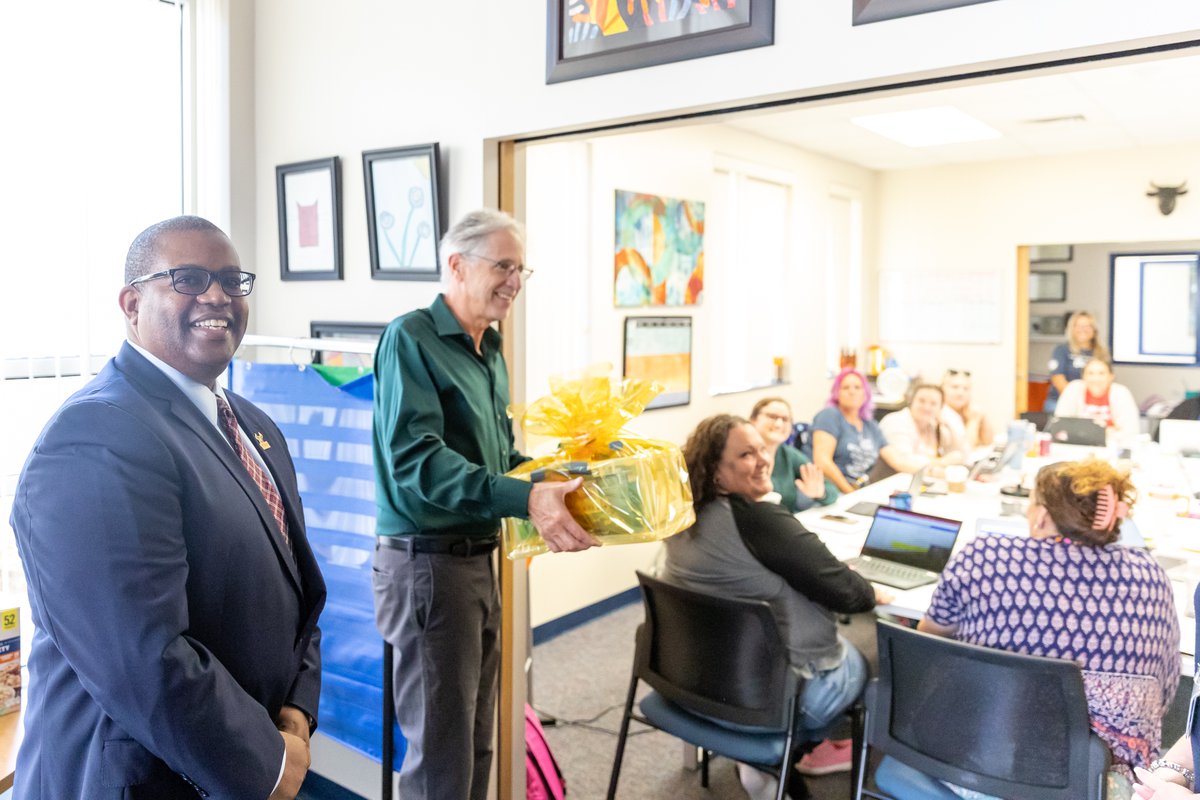 educationUSF's tweet photo. Alyssa Santana, a new teacher at Wiregrass Ranch Elementary School was surprised today with a “Congratulations” basket from the USF Education Alumni Society. And she was even wearing her USF green for her meeting with Dean Rolle! @pascoschools #edusociety https://t.co/ehwW1XXAdV