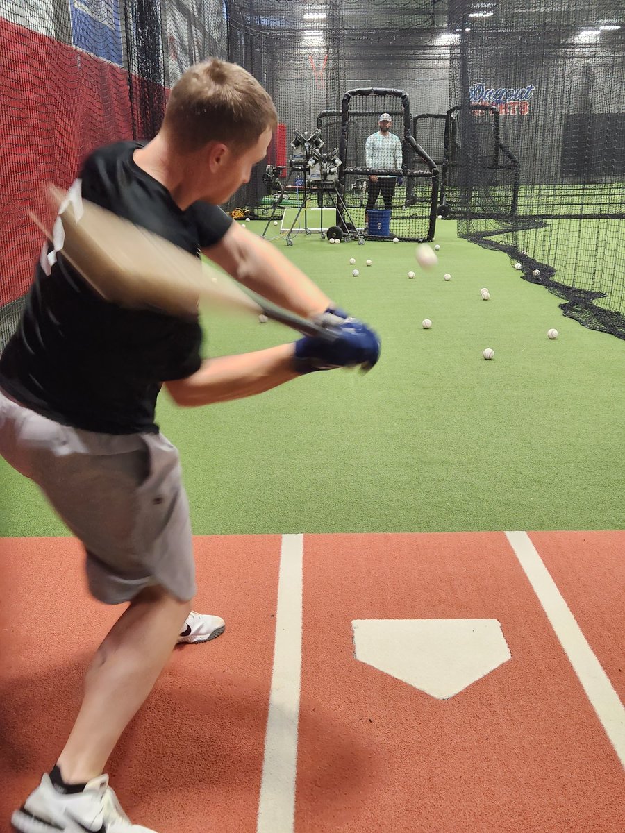 DugoutSportsF's tweet photo. Professionals @kylecrowl_12 and @TylerCropley working off 2 machines today, 1 set to fastballs at 90+ and 1 machine to right-handed curveballs. The @Sports_Attack machines with wheels make them easy to use for all drills! #AngleBP #DugoutFam #OPEN365 #MLB https://t.co/Tp6nzX7aSk