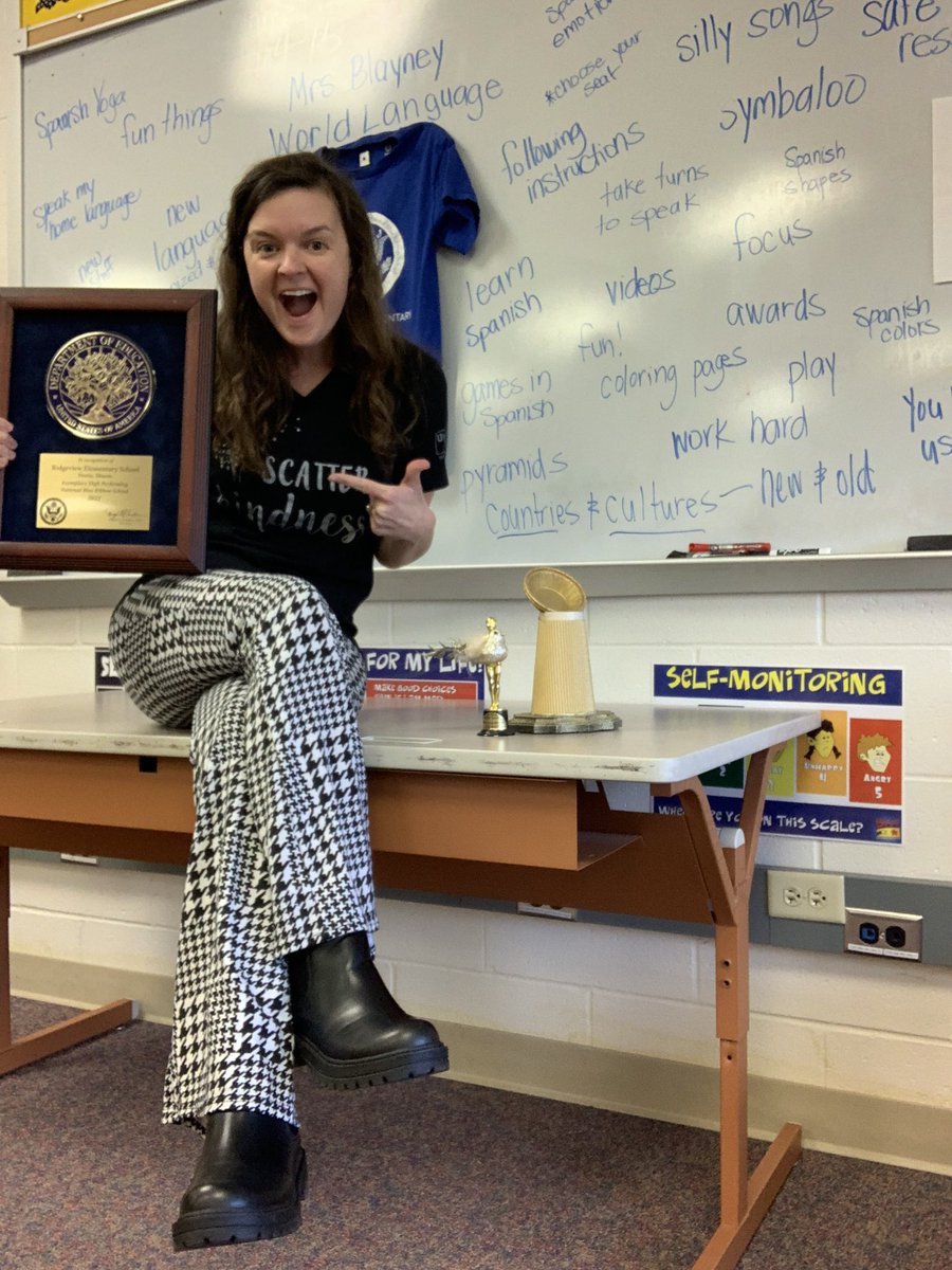 WhitneyBlayney's tweet photo. This week I hosted our #NBRS2022 aware in my classroom. I displayed it with my other prestigious awards — Pie Eating Contest champion &amp; Peep War champ! @RidgeviewLearns #323learns https://t.co/wcn72vK521