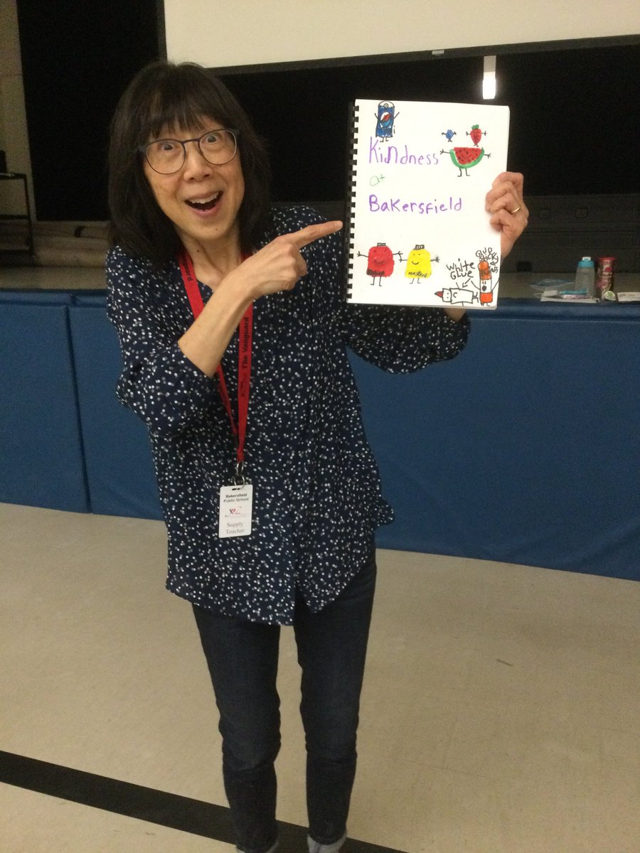 Before she left, we presented her with a book created by the students in the primary division!