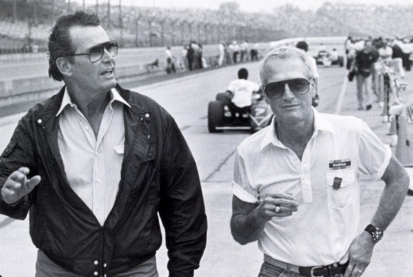 LiterateIndy's tweet image. You might think you're cool, but nobody is as cool as Paul Newman (born on this day in 1925) walking along the track with James Garner in May 1985. #Indy500