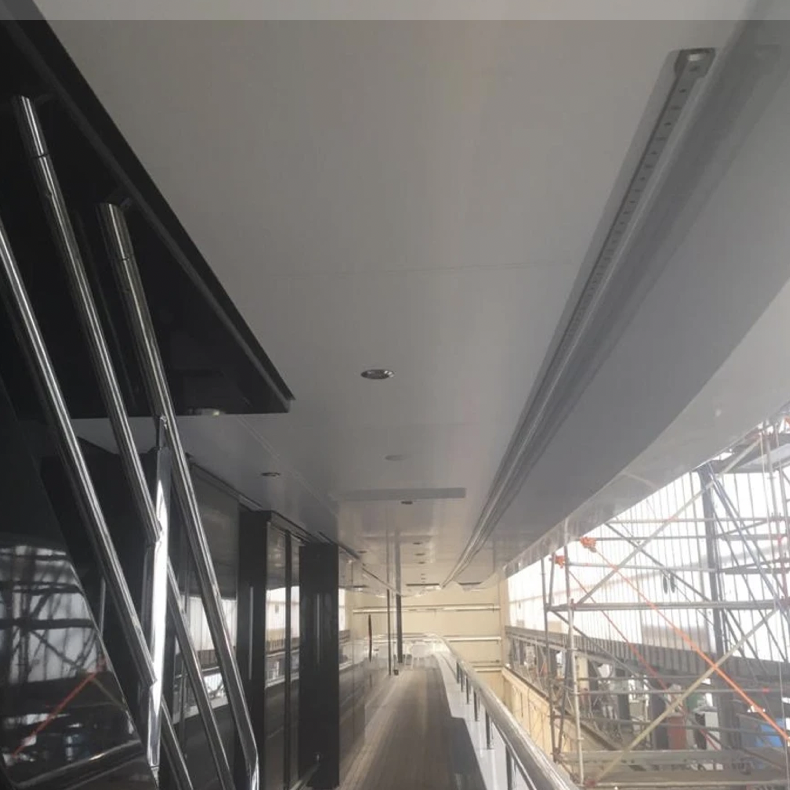 The ADVANTAGES of wrapping deck heads:
- very easy to keep clean
- don't show suction ring marks
- the film is non directional so you will not see the odd panel standing out
- easy to repair, and will not stand out against existing panels
- very long lasting - approx 10yrs