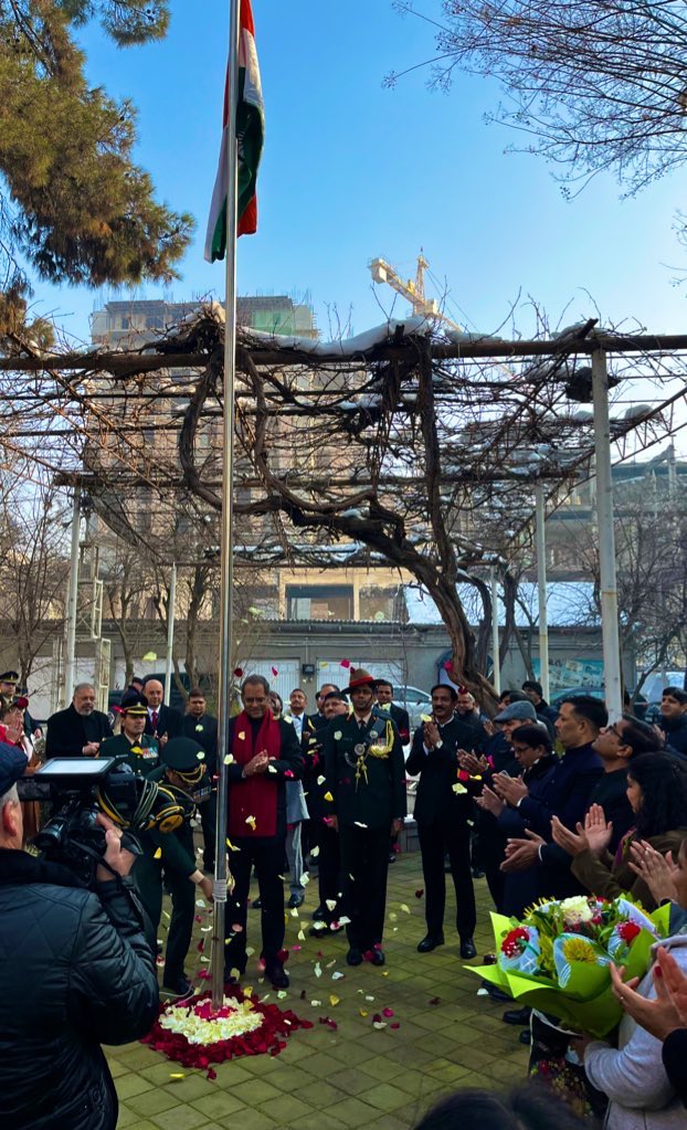 IndEmbDushanbe's tweet photo. EoI Dushanbe celebrates 74th Republic Day with unfurling of the Tiranga by Amb @VirajSinghIFS and singing of the National Anthem by Indian Diaspora and friends of India present on the occasion. https://t.co/IYBNwZ7DTt