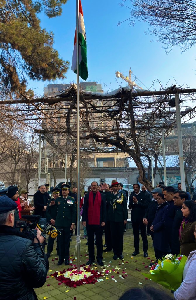 IndEmbDushanbe's tweet photo. EoI Dushanbe celebrates 74th Republic Day with unfurling of the Tiranga by Amb @VirajSinghIFS and singing of the National Anthem by Indian Diaspora and friends of India present on the occasion. https://t.co/IYBNwZ7DTt