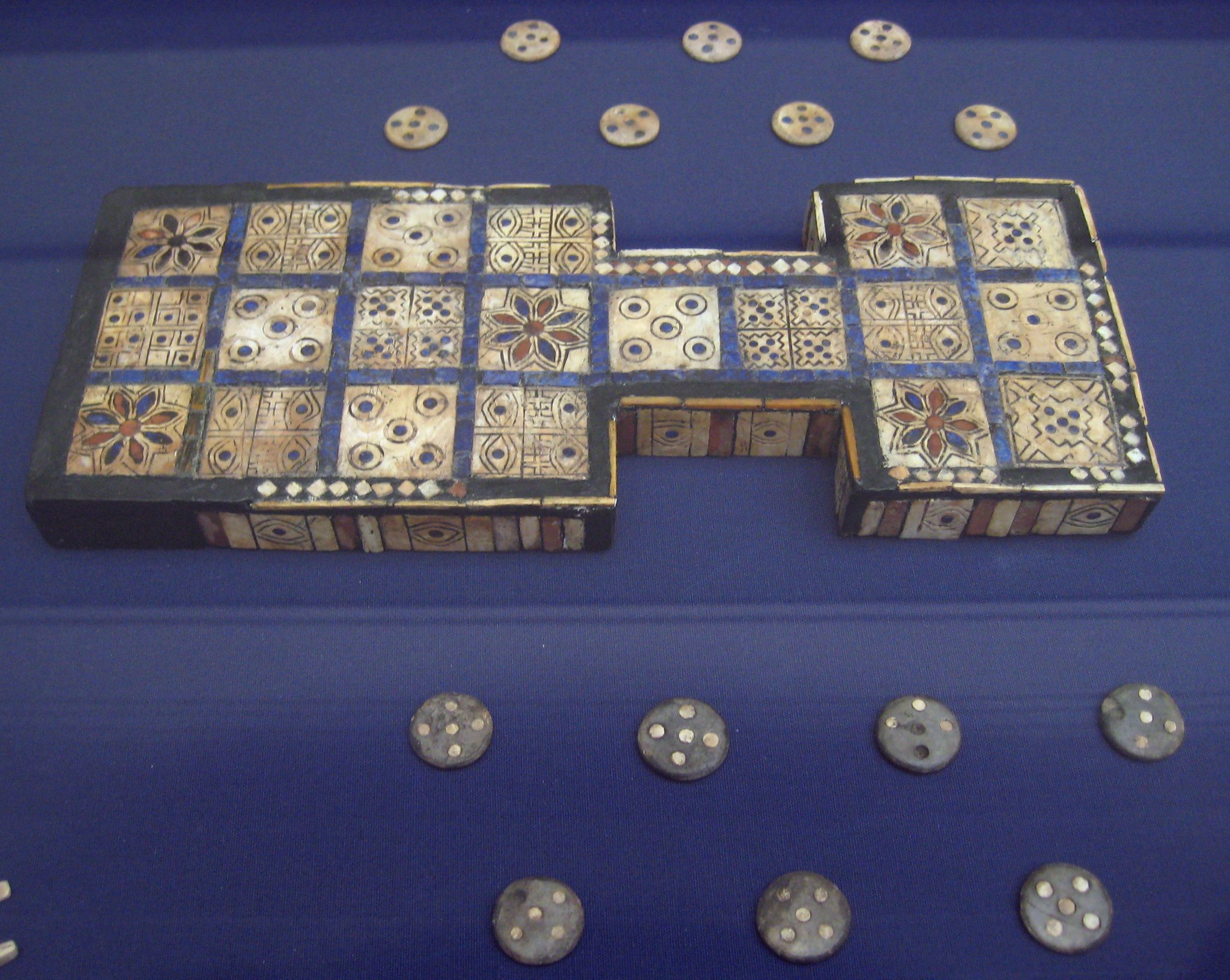 Queen Puabi's head-dress was excavated from the Royal Cemetary at Ur, along with these lyres and boa