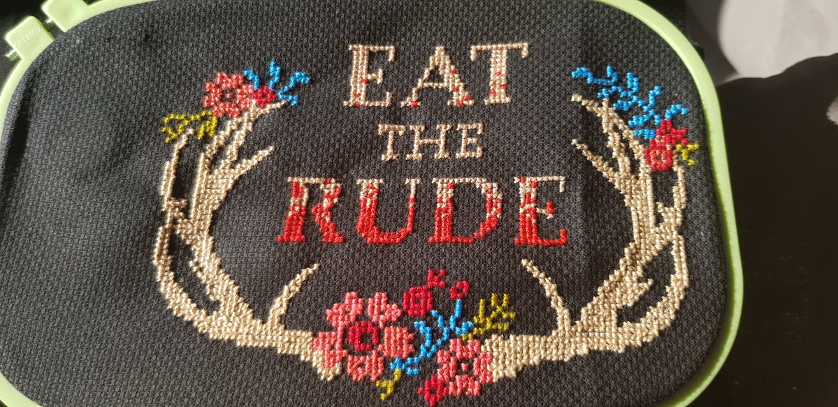 Espeze32's tweet photo. For #CraftyThursday Just shamelessly showing off one of the gifts I made for my sister, we're both #Hannibal fans and I put this on an apron for her 🤣 #crossstitch #crossstitchaddict https://t.co/yYrMO18MY2