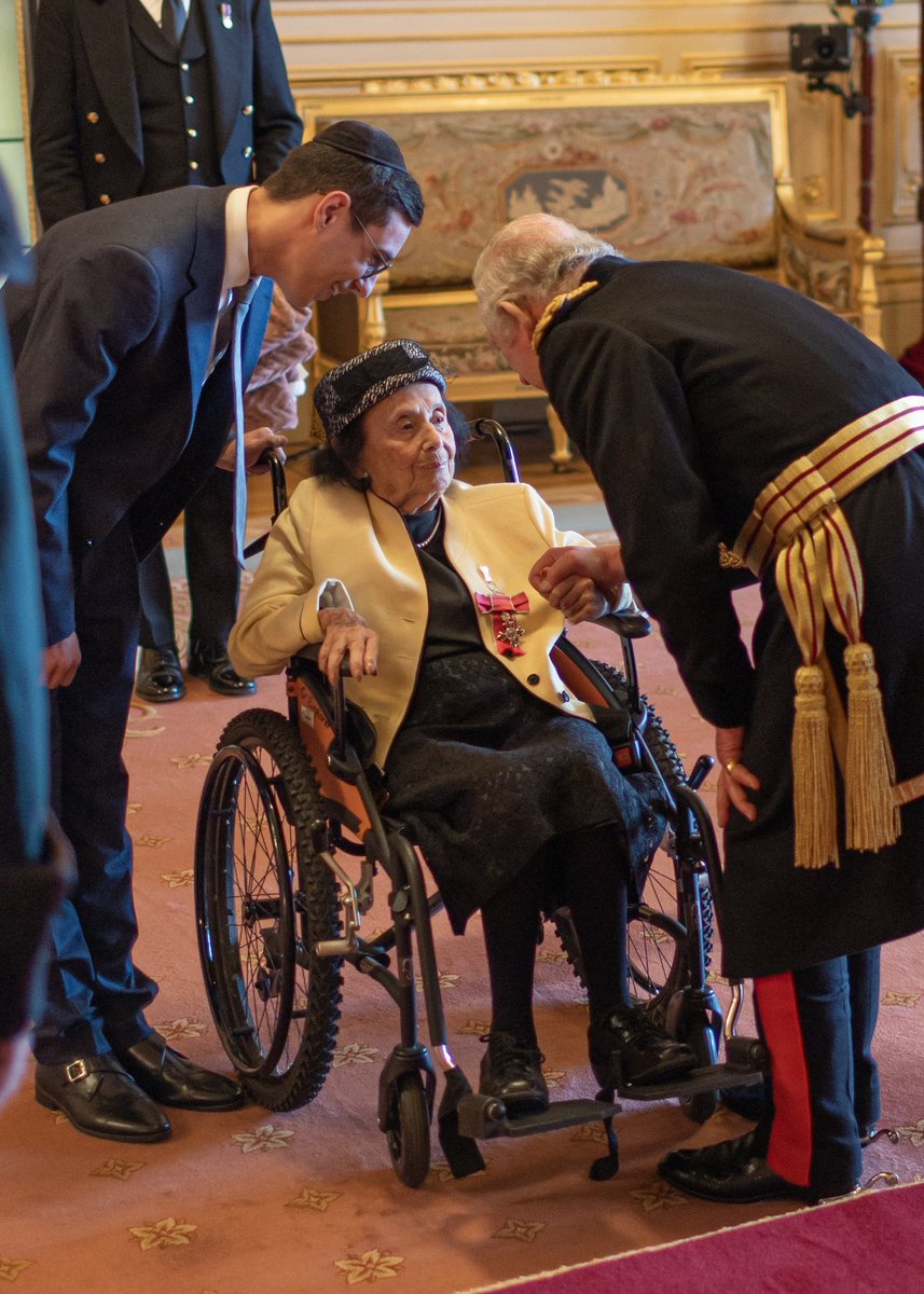 My 99 year old great grandmother Lily Ebert, an Auschwitz survivor, receiving her MBE from His Majesty King Charles, at Windsor Castle, on Tuesday. Honoured to have been by my great grandmother’s side for this special moment. ❤️
