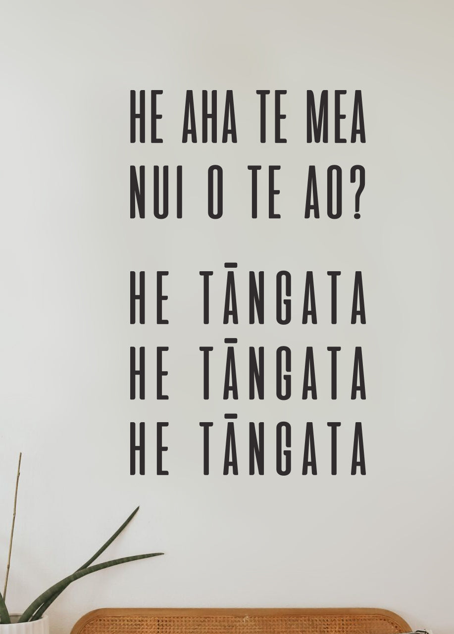 Lettering on a wall in te reo Māori "he aha te mea nui o te ao? He tāngata, he tāngata, he tāngata. 