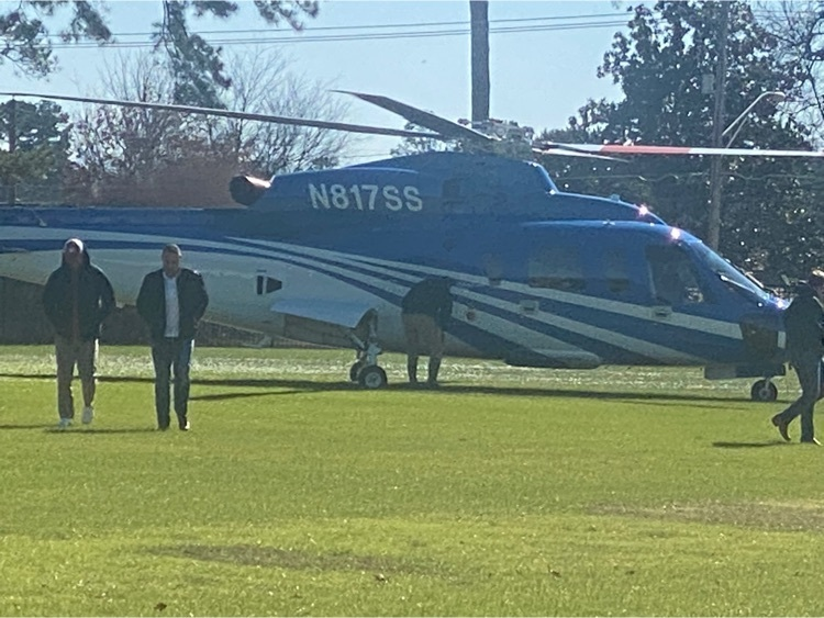 Coach Sarkisian, University of Texas, visits Pine Tree High School recruiting Dealyn Evans. Gung Ho!