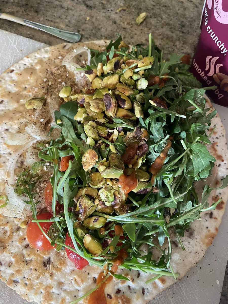 joemuggs's tweet photo. plain tahini, raw onion, a fresh green chilli, roast red pepper, cherry toms, fresh mint & coriander, rocket, toasted pistachios still hot out of the pan, LOADS of zaatar, a little dusting of sumac and a splash of hot sauce… bish bash bosh #wrapgame https://t.co/mph6Z5l6Rh