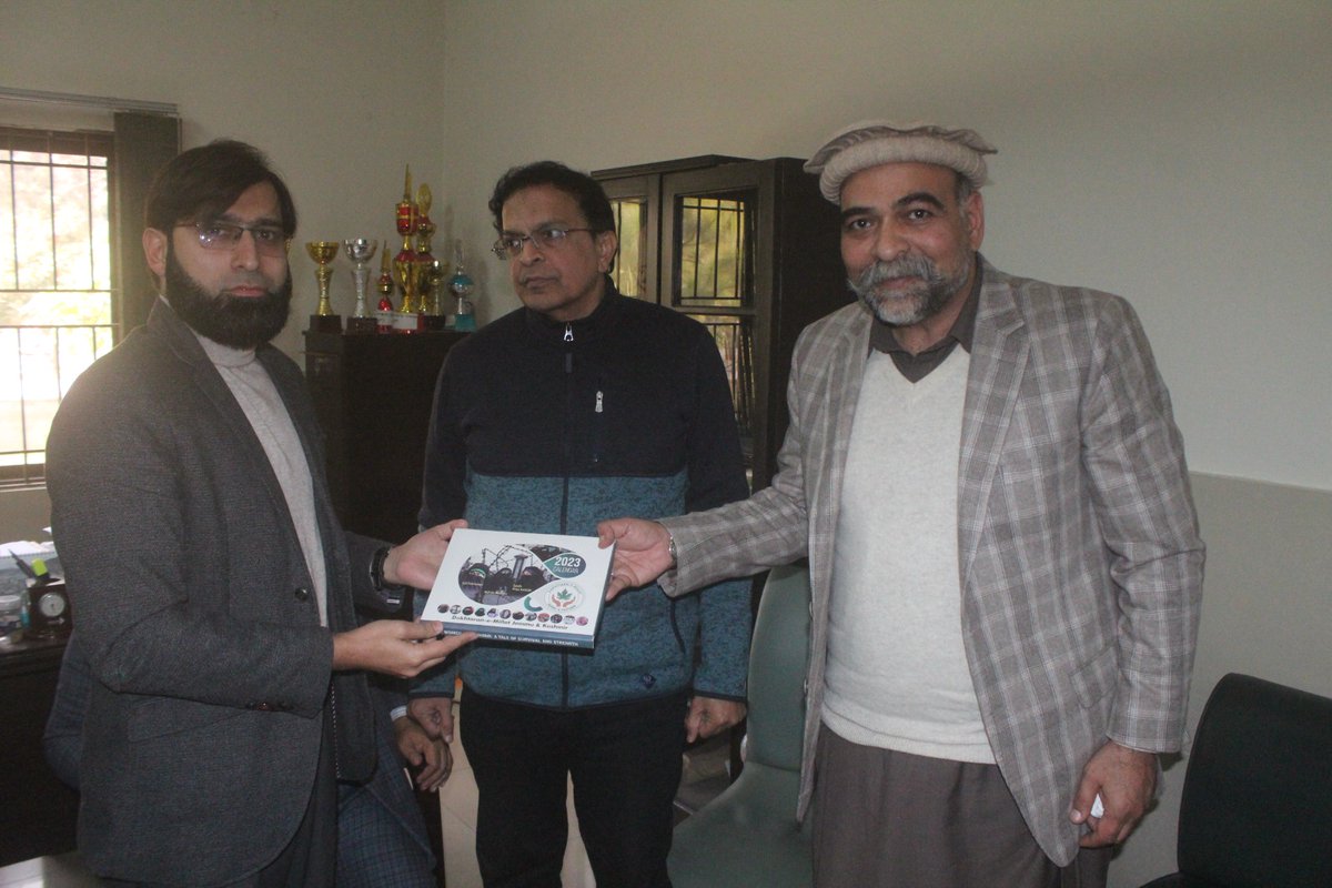 Dukhtaran e Millat Calendars being awarded to academicians.
In picture: President KYA with Prof. Dr Abdul Saboor, Dean Faculty of Social Sciences, PMAAS-UAAR,
Dr. Abid Ghafoor Chaudhry, Chairman Dept of Anthropology, PMAAS-UAAR