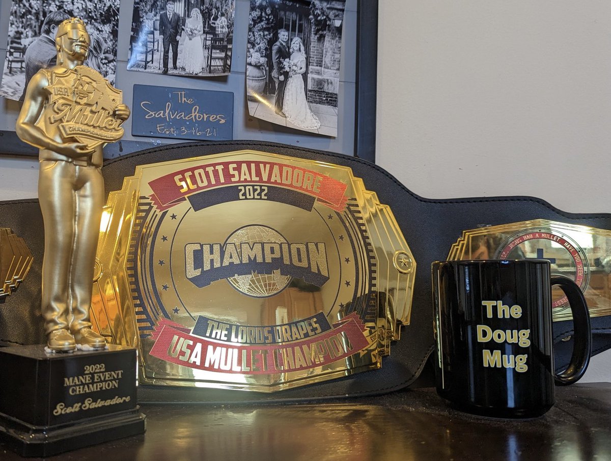 A bucket list moment: the Doug Mug on the mantle next to a championship belt. 😭 (And with champ’s mom and dad smiling down no less!) 
Long live the Mullet King! <a href="/ScottSalvadore/">Scott Salvadore</a> <a href="/MulletChampUSA/">USA Mullet Championships</a>