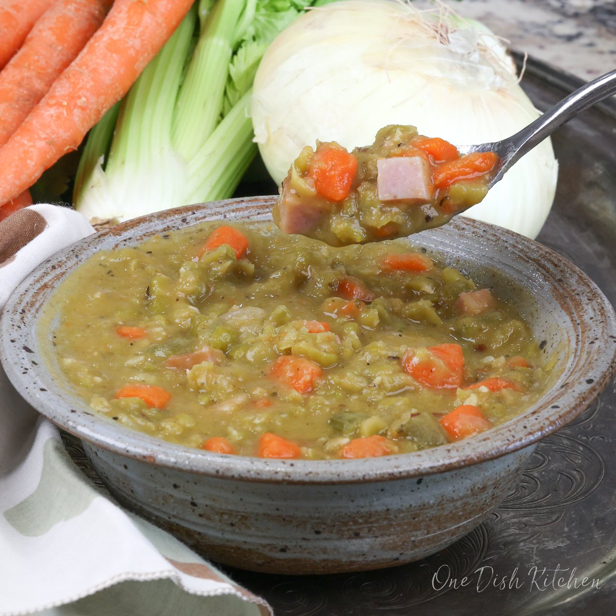 OneDishKitchen's tweet image. A classic split pea soup recipe scaled down to serve one person. Green split peas are simmered with plenty of vegetables and flavorful ham until tender. Easy, packed with protein, hearty, and incredibly delicious! onedishkitchen.com/split-pea-soup/ #cookingforone #soup