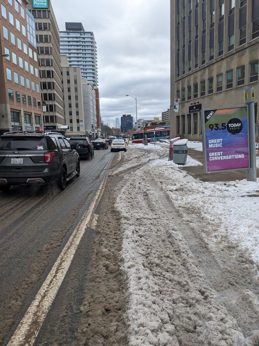 benFsinger's tweet photo. Yonge bike lanes South of Davisville are completely impassable. Please address this immediately. Cc @Yonge4All @TO_Cycling. @311toronto Twitter is not coming up. Did they delete it? Bizarre https://t.co/6G1G3FCBws