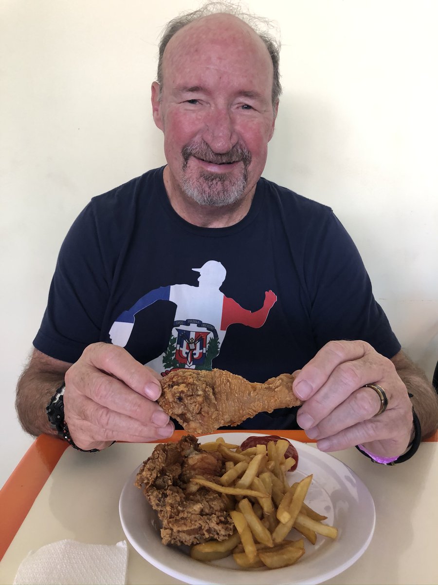 Board Chair Steve demonstrates what a true Dominican would eat - chicken fried! #j1nine #joshua1nine #foodie #dominicanfood