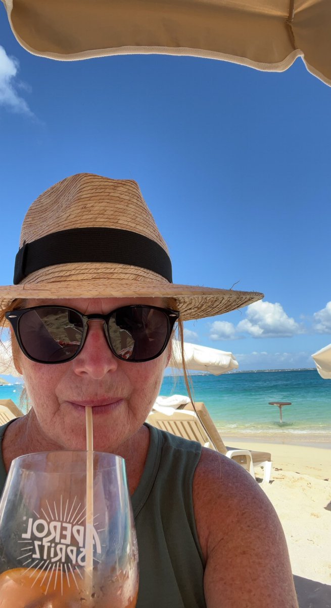 KiminHalifax's tweet photo. Sitting on a beach chair in @SaintMartin_sxm @laplagebeach #grandcase and @depechemode Personal Jesus a la Man in black comes on @DaveGahanFans .. Best day! #aperolspritz https://t.co/Ch8JVdxmJg