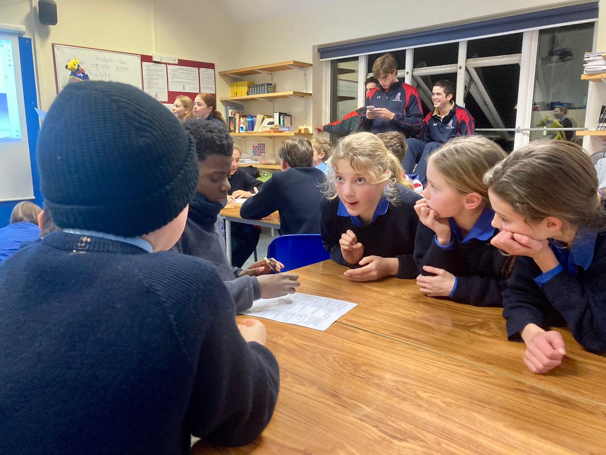 CheamBoarding's tweet photo. Our awesome Gappers @CheamSchool put on an Australian Day quiz for the boarders this evening. Our chefs also made some ‘lamingtons’ to enjoy after supper, the “best Australian dessert” according to the Gappers from down under! #CheamBoarding #AustraliaDay https://t.co/91yvKft0MP