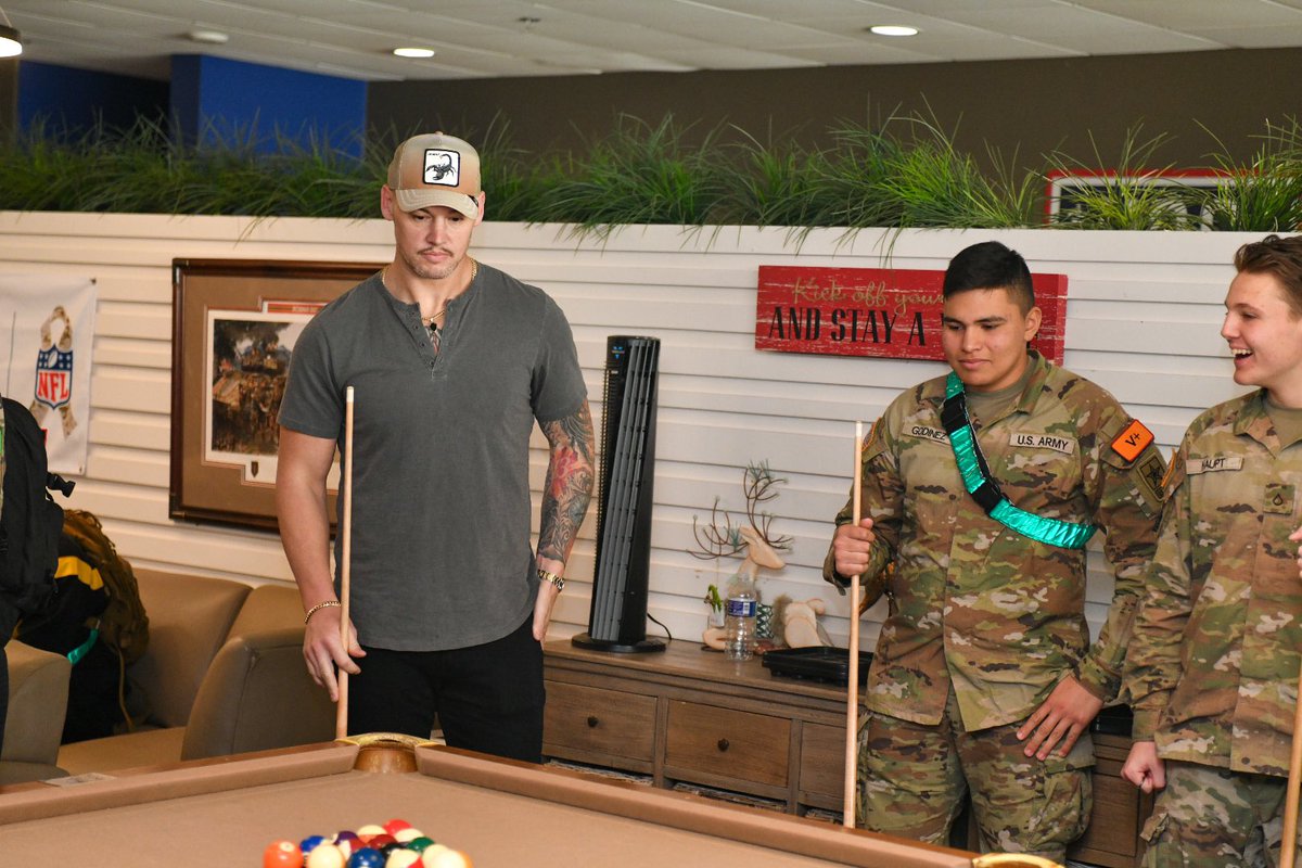 JBSA_Official's tweet photo. As part of their visit to JBSA-FSH, @WWE superstars had the chance to see just what makes @The_USO a special place!

The superstars Omos and Baron Corbin were able to see for themselves, getting a quick game of pool in with some trainees. https://t.co/hqo3xroIZ1