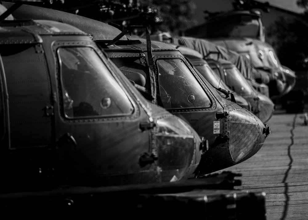 JointBasePHH's tweet photo. @25thID  soldiers work together to prepare aircraft for transport aboard U.S. Navy vessels on the piers of @JointBasePHH to support various training exercises in the @INDOPACOM, including #CobraGold2023, 1.10.23. #UH60Blackhawks #AH64Apaches #MH60medevacBlackhawks @USArmy https://t.co/81bjQvJwMZ