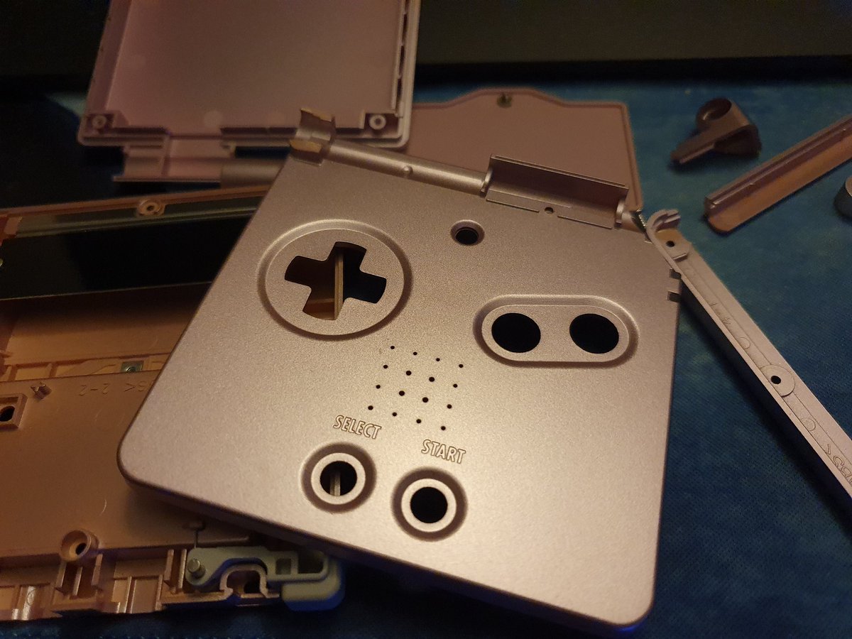 dinnaekengames's tweet photo. Nice little project this evening, re-shelling an old Gameboy Advance  SP that had a broken hinge.

Just a little bit fiddly, but nice job in the end, new shell looks cool and can get back to catching 'em all! https://t.co/XP0ikQdpHG