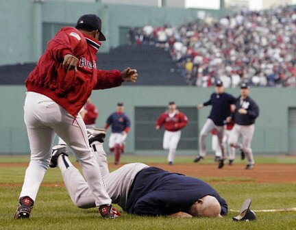 Pedro Martinez throws Yankees coach Don Zimmer to the ground during a brawl, 2004