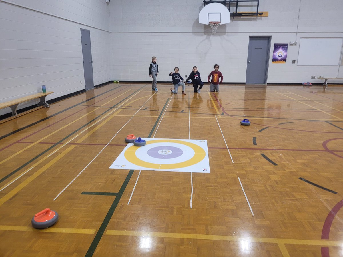OLOPecsd's tweet photo. Mme Richer’s grade 1 students enjoyed learning about curling.  First we watched a video from CBC Olympics and learned vocabulary associated with curling. Next we went to the gym to practice.  So grateful to our school for giving students these opportunities.#ecsdfaithinspires https://t.co/O7qhi8vB5H