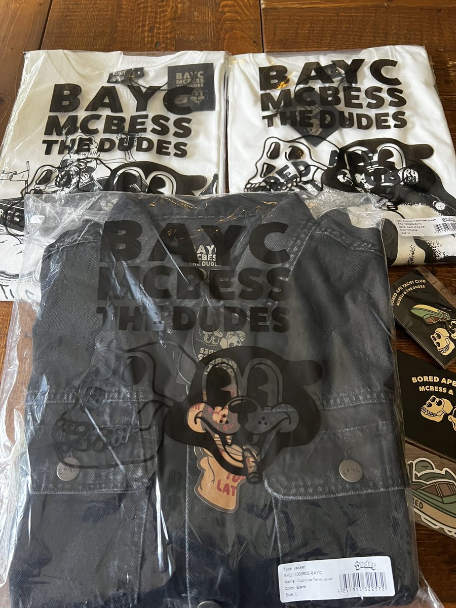 CryptoVonDoom's tweet photo. Went outside when Dookey Dash went down for maintenance for the first time in days. Before making it all the way outside and off of my porch to touch grass I retrieved a giant box containing the new @BoredApeYC merch collab w/ @DudesFactory. 
Best merch drop yet.
GG https://t.co/S85MlljrlS