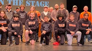 Our strongest turnout yet.  Great to have nearly 30 alumni, a dozen modified and a dozen youth wrestlers.  Wonderful night to reflect on our history, have a glimpse into our future and watch our present wrestlers take to the mat to continue and uphold our Saints Tradition.