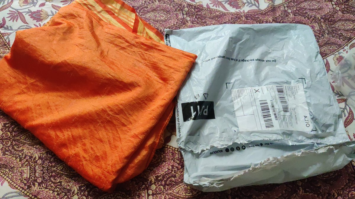 Cosmo____Kramer's tweet photo. @AJIOLife I had placed an order for a couple of jeans on Jan 22, one of which was delivered today. Found this random piece of cloth inside the package instead of the Jeans I ordered. The Wrangler cover was there but product has been replaced by someone. HELP! https://t.co/LCWI4ESO9n