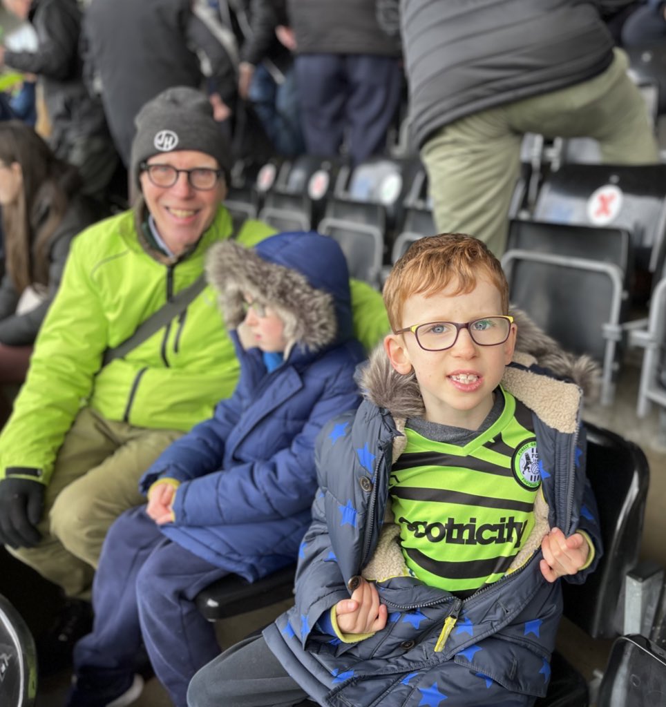 Tom_L_Elliott's tweet photo. @FGRFC_Official I’m a huuuuge Big Dunc fan. And Forest Green are my second team.  Match made in heaven! This is one of my boys, Reuben at a recent game. Behind is Oscar, who’s teddy is called “little Dunc!” after the big man! Great appointment! https://t.co/8CWd4x6yOA