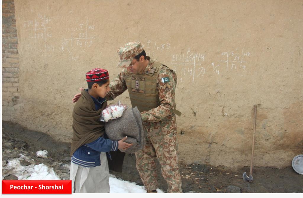 KPTribune's tweet photo. #PakistanArmy distributed ration and winter clothes provided by #Peshawar Corps among the needy, poor and deserving people in remote villages of Piochar including Doglai, Talkar, #Shagha, Dherai and Shoorshai. https://t.co/r6usIDqlg1