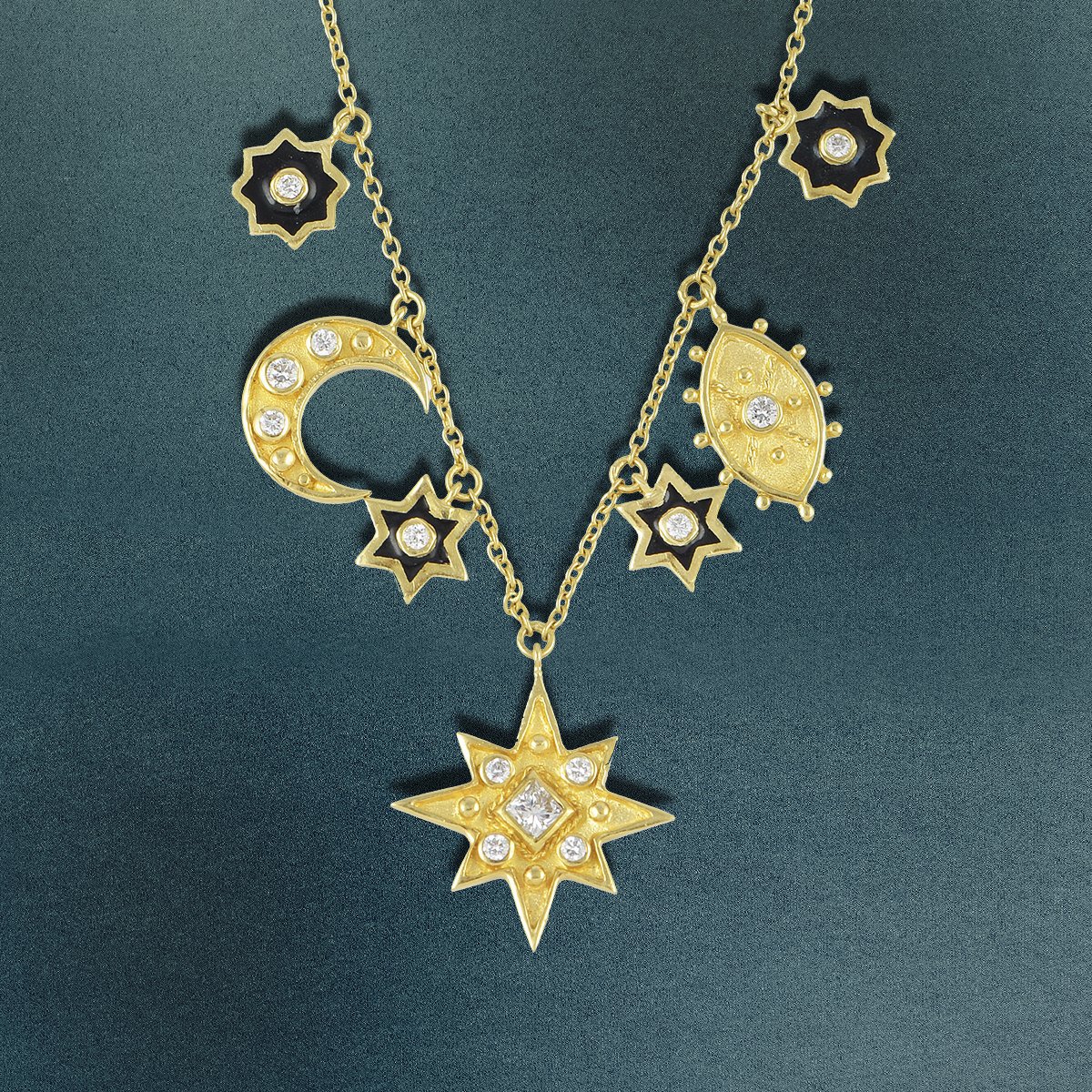 LegendAmrapali's tweet photo. With a beautiful confluence of contemporary design aesthetics with ancient techniques, the handcrafted Diamond Celestial Charm Necklace With Black Enamel in 18k gold personifies protection, happiness &amp; positivity.

Shop link
https://t.co/doZS9RsrYi https://t.co/augEMVlLXI