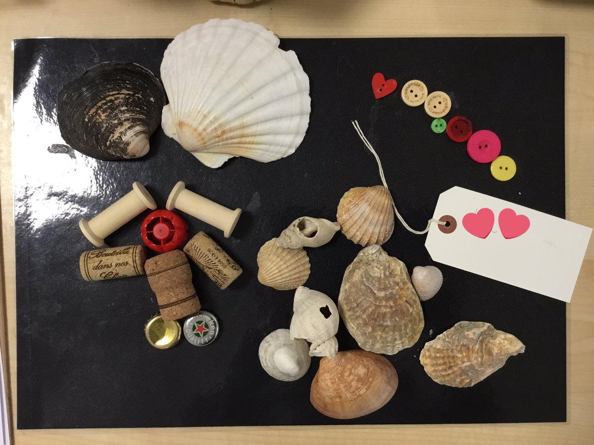 One of the children’s interpretation of community through loose parts “All the things are lots of people. There’s a love heart because other people give to you and you give to them. The buttons and shells stick together because they’re a part of everything” #jppsinspire