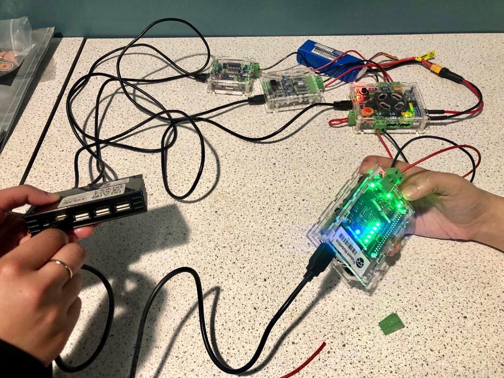 LangleyGS_Tech's tweet image. Year 12 soldering wires and getting components ready for their #srobo2023 robot!