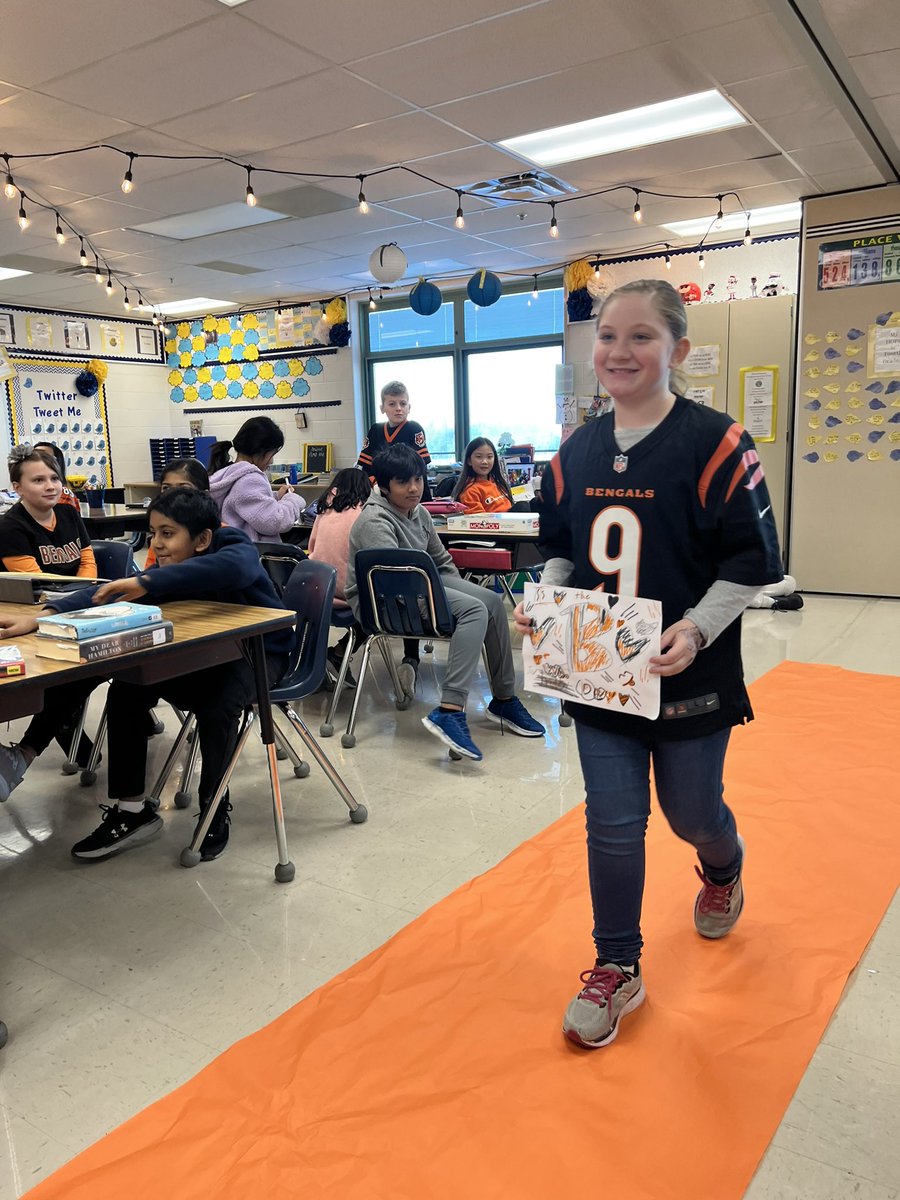 thackerteaches's tweet image. Since we have so many Ss dressed in their black and orange attire, we decided to roll out the orange carpet for a Bengals Fashion Show!! Who Dey!!🧡🏈#KindnessStartswithME #WhoDey