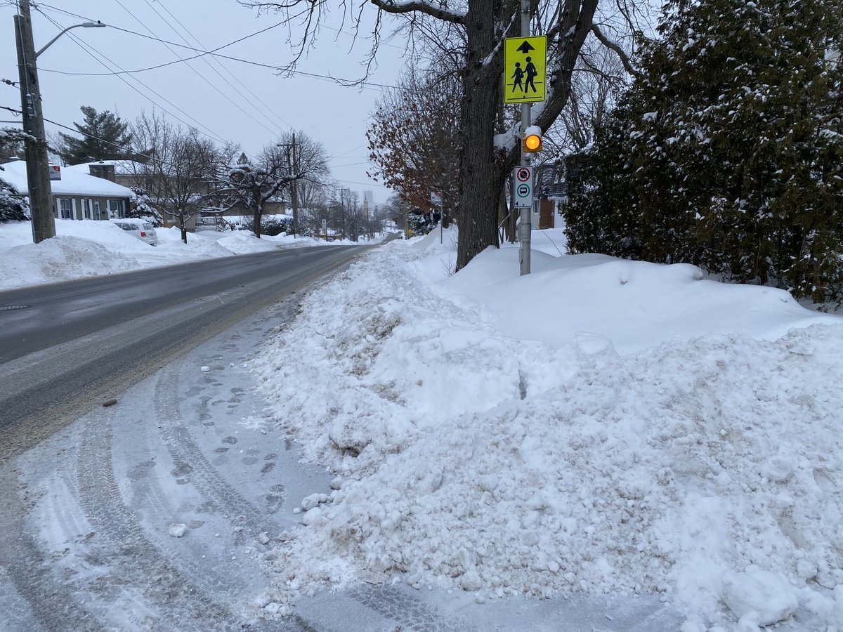 RobJee1's tweet photo. The sidewalks of Alta Vista. My kids commute on foot in the bike lanes after storms on busy Kilborn. We can do better Ottawa. https://t.co/Go8tH2gXGo
