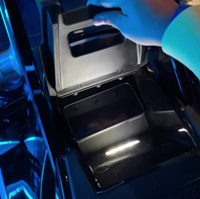 AshleyLCarter1's tweet photo. The TRON Lightcycle Run ride vehicles will have a small compartment that can hold items such as cellphones, glasses or wallets. https://t.co/GhGfhRA2rT