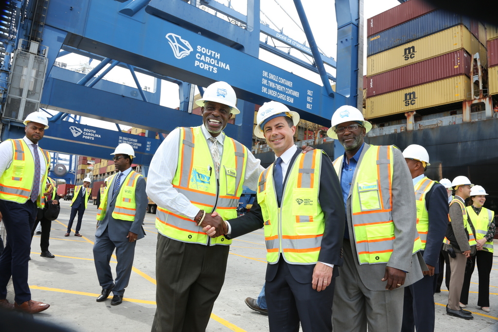 Secretary Pete with local leaders at the South Carolina Ports in Charleston, SC.