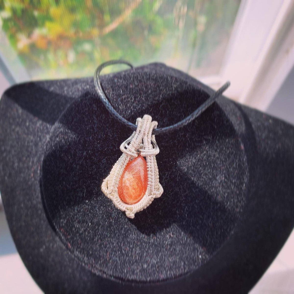 This lovely #Sunstone in #SterlingSilver #WireWrappedPendant is available for 25% off in the #WinterWarmer #sale now. Get this dainty #wirewrap for a steal!  #etsy #silverwirewrap #silverwirejewelry #sunstonejewelry etsy.me/3DlmipD