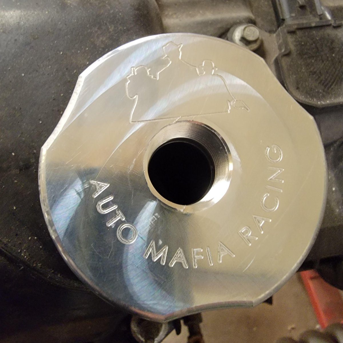 MafiaAuto's tweet photo. Yes we make parts here in house and in the USA and here in Montana! Who wants a billet oil cap?! #TeamAMR #AutoMafiaRacing #MafiaMade #MadeinMT https://t.co/02GEjbduGj