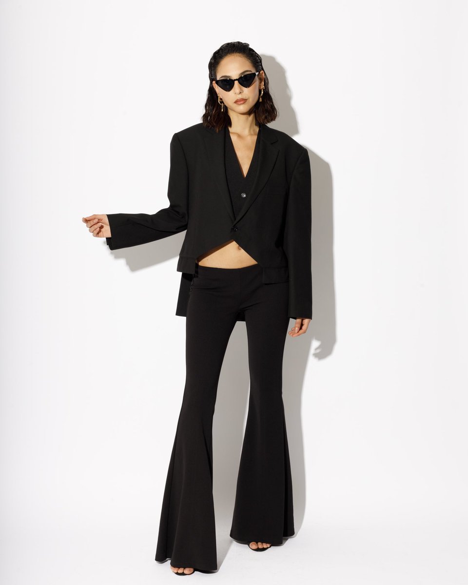 Look 2 from the new #HASANHEJAZI 2023 collection. Low rise flared trousers worn with cut out tuxedo blazer and cropped waist coat. 

#newcollection #fashionweek #fashiondesigner #womenswear