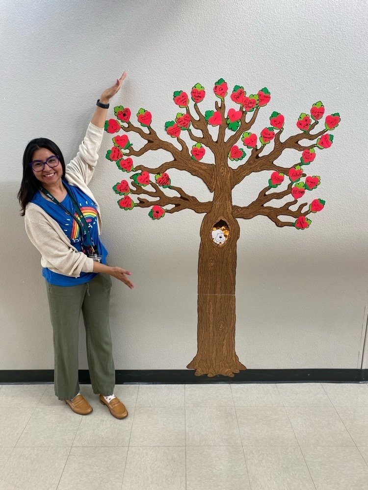 swisd_mca's tweet photo. Ms. Maldonado, 8th grade Science teacher, showing off her Kindness Tree that keeps growing and growing. Her students are definitely getting the the spirit of #GreatKindnessWeek! 🚀 #RocketStrong https://t.co/qRAaRixyrn