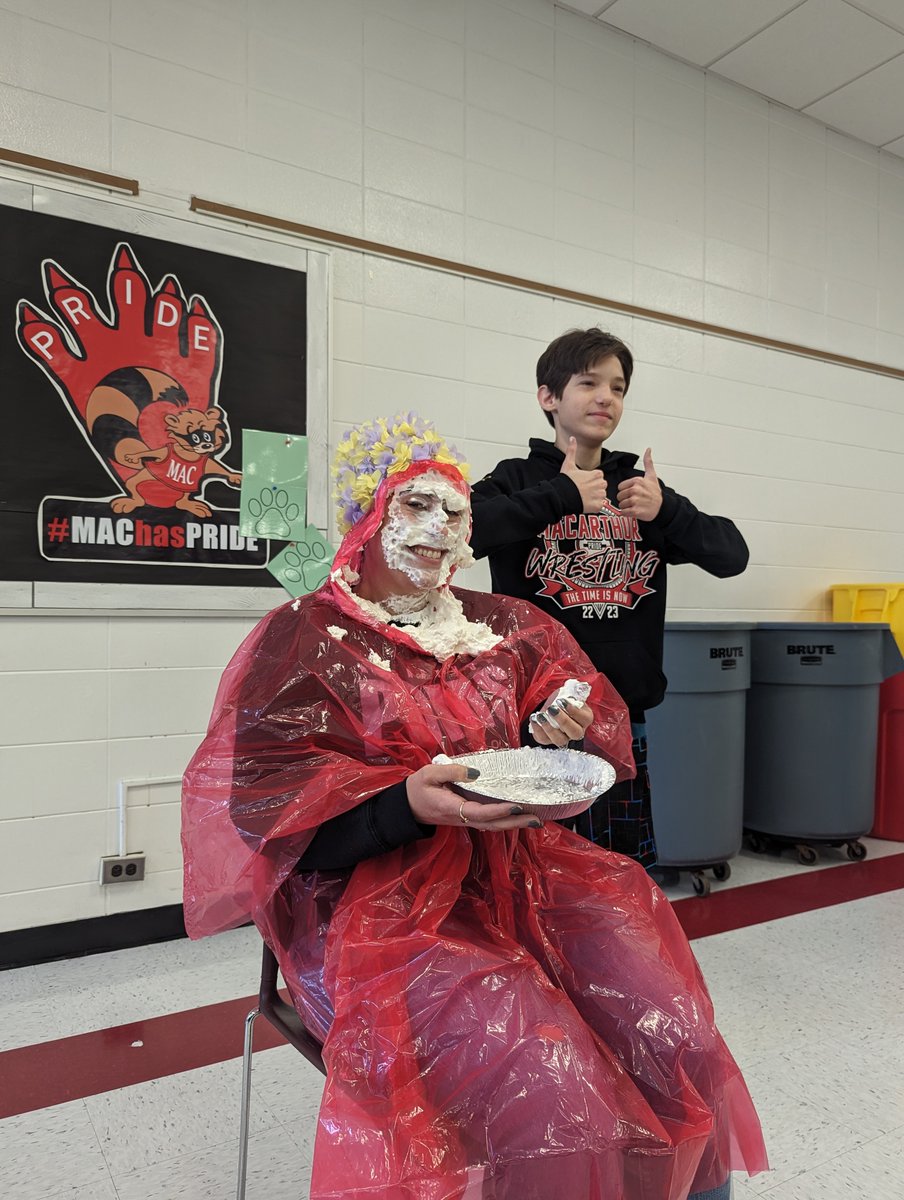 8thMacarthur's tweet photo. @D23MacArthur did an amazing job raising money during our penny wars fundraiser. Today, Mrs. Joffe braved the pie in the face because her advisory had the most negative points = most money raised! #MAChasPRIDE https://t.co/2WHTGa16LW