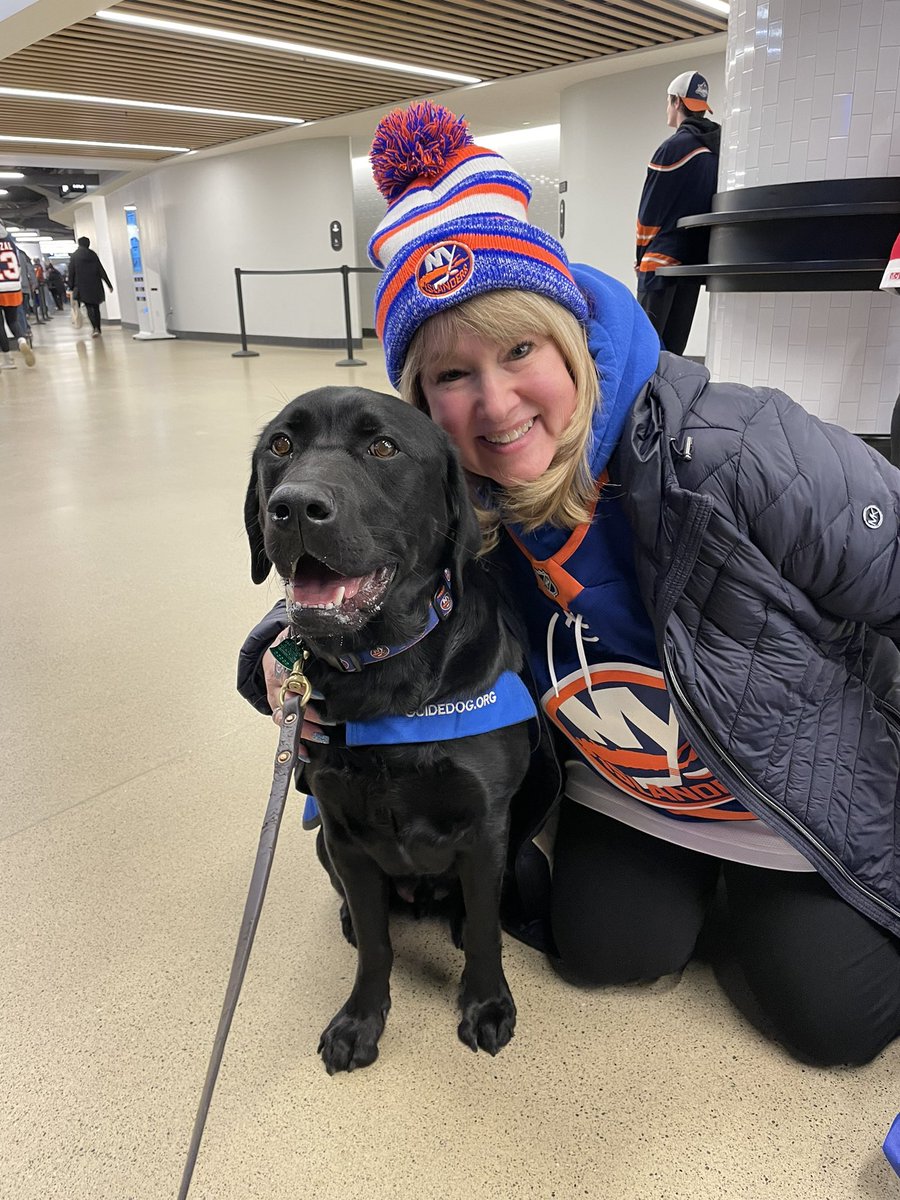 Deborah512's tweet photo. Monte’s last game before he begins Guide Dog training.  GOOD LUCK! 🧡🍀💙 #isles #letsgoislanders #ubsarena https://t.co/acDgxT9PAk