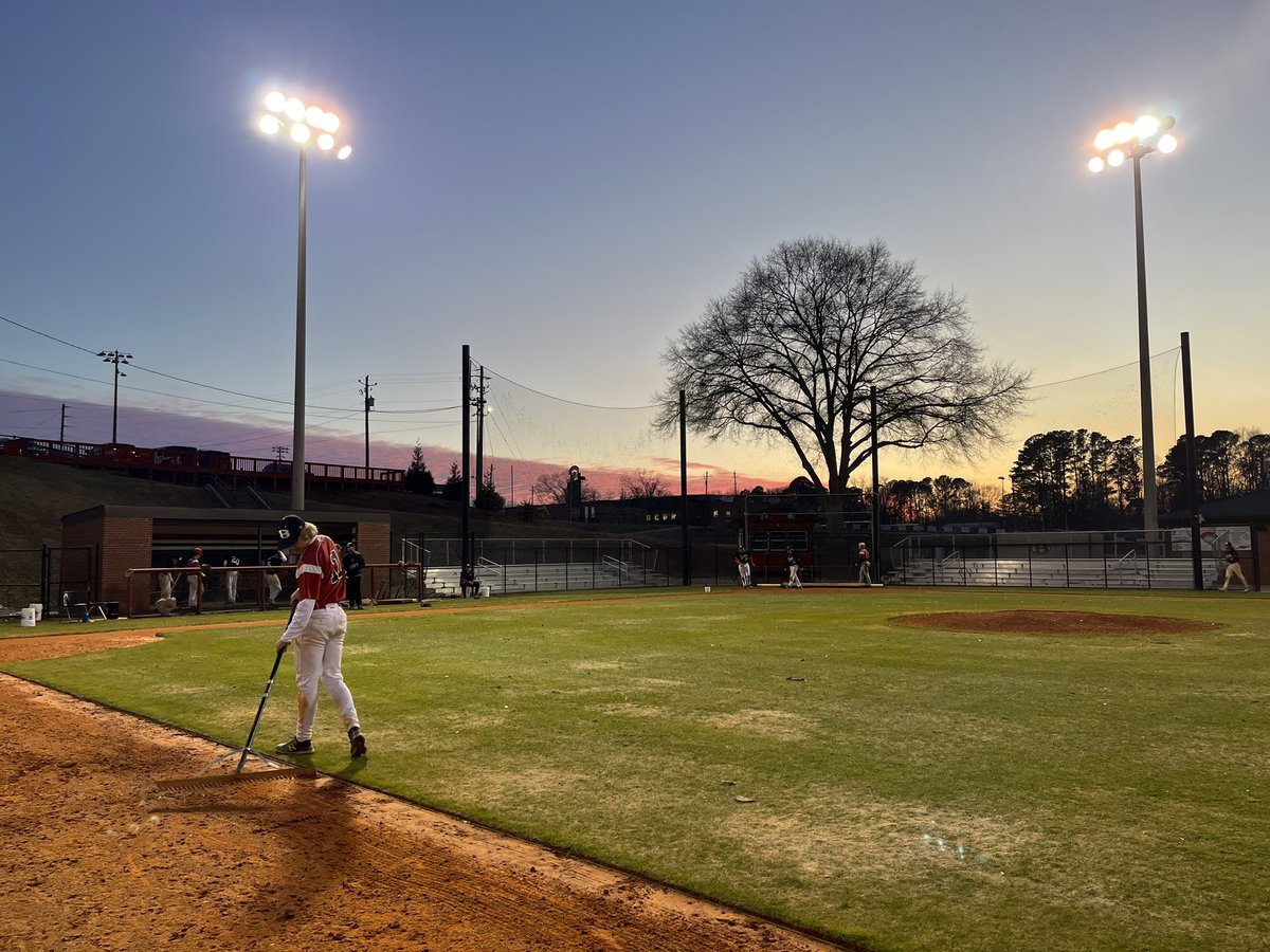 bowdon_baseball's tweet photo. Dragging the field tonight and my guys stopped me to snag a picture to post. Great reminder to slow it down and take it in!! Thankful for a group of dudes who work hard everyday!! #EATDAT https://t.co/MmxWSrV9Bz